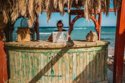 digital nomad next to sea